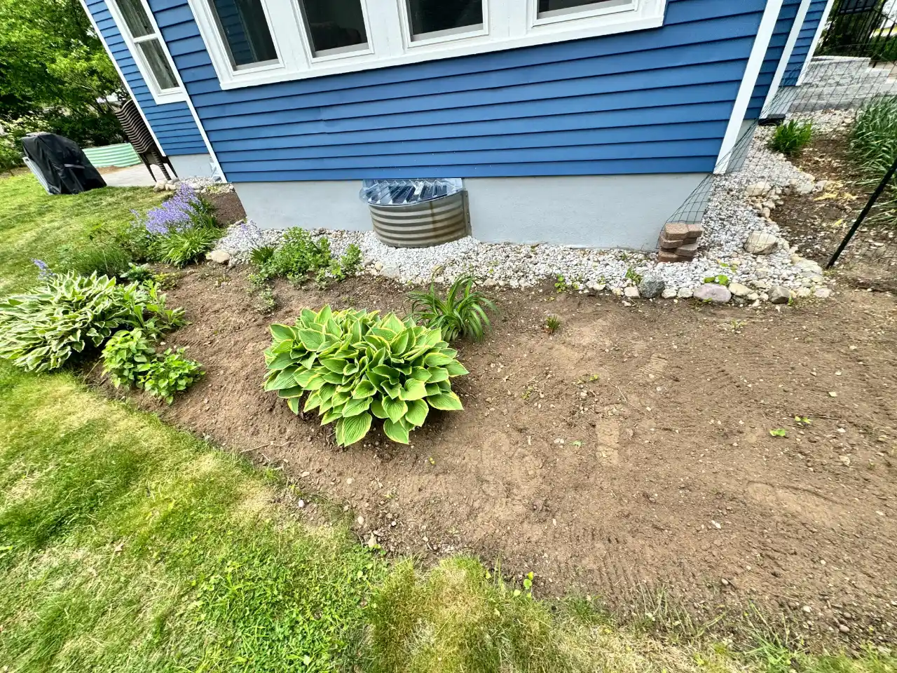 Completed yard cleanup job on a residential lot in Hanover